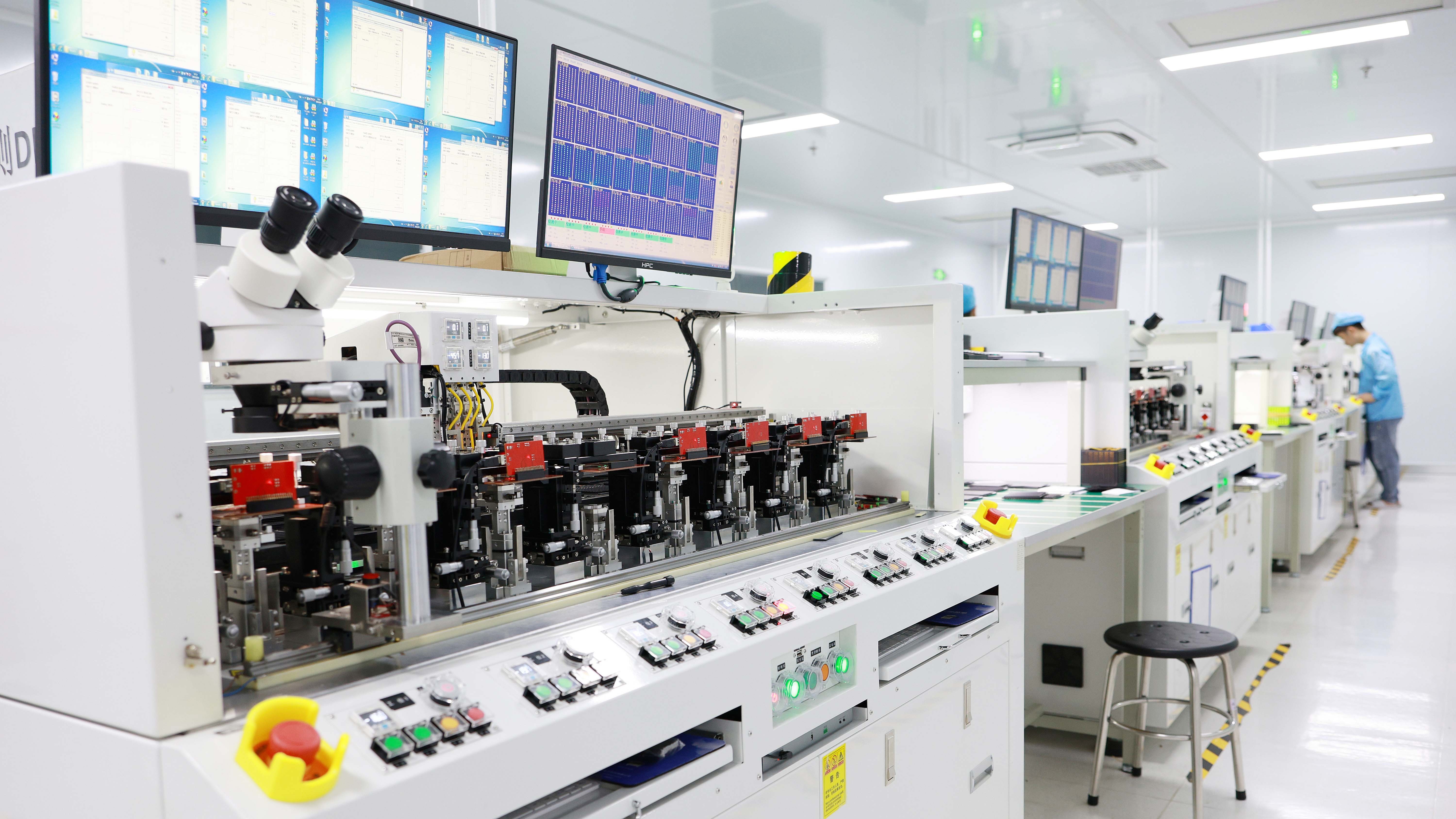 Taimi engineer operating precision SMT assembly line for SSD manufacturing