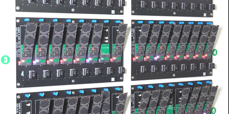 Multiple SSDs undergoing high-temperature testing during burn-in validation